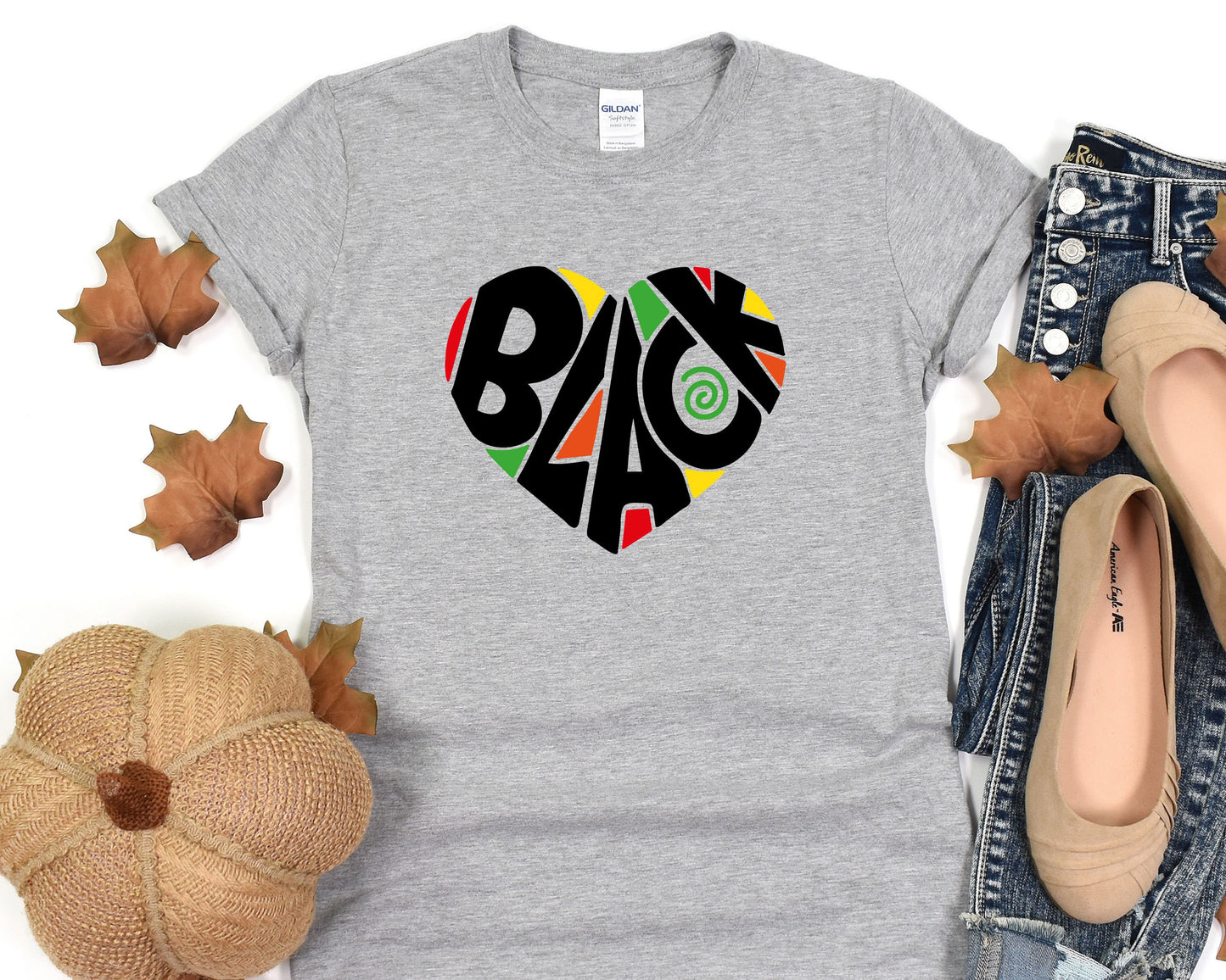 a women's t - shirt with the word back in a heart