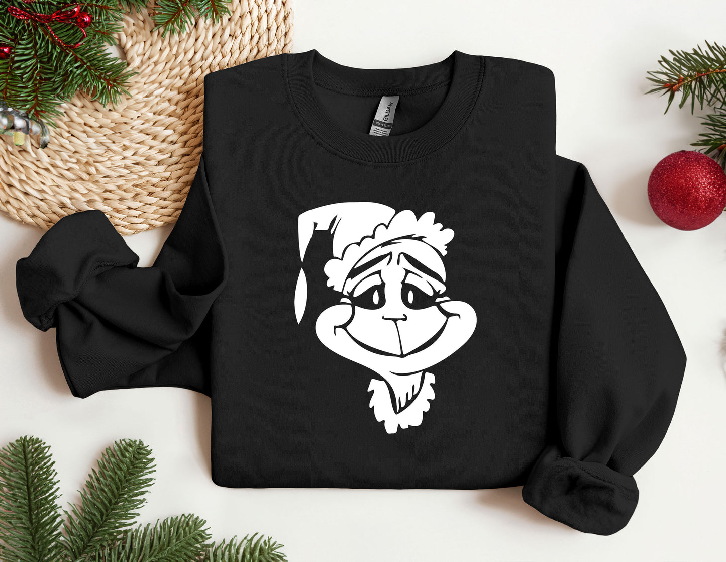 a black sweatshirt with a white image of a cartoon character