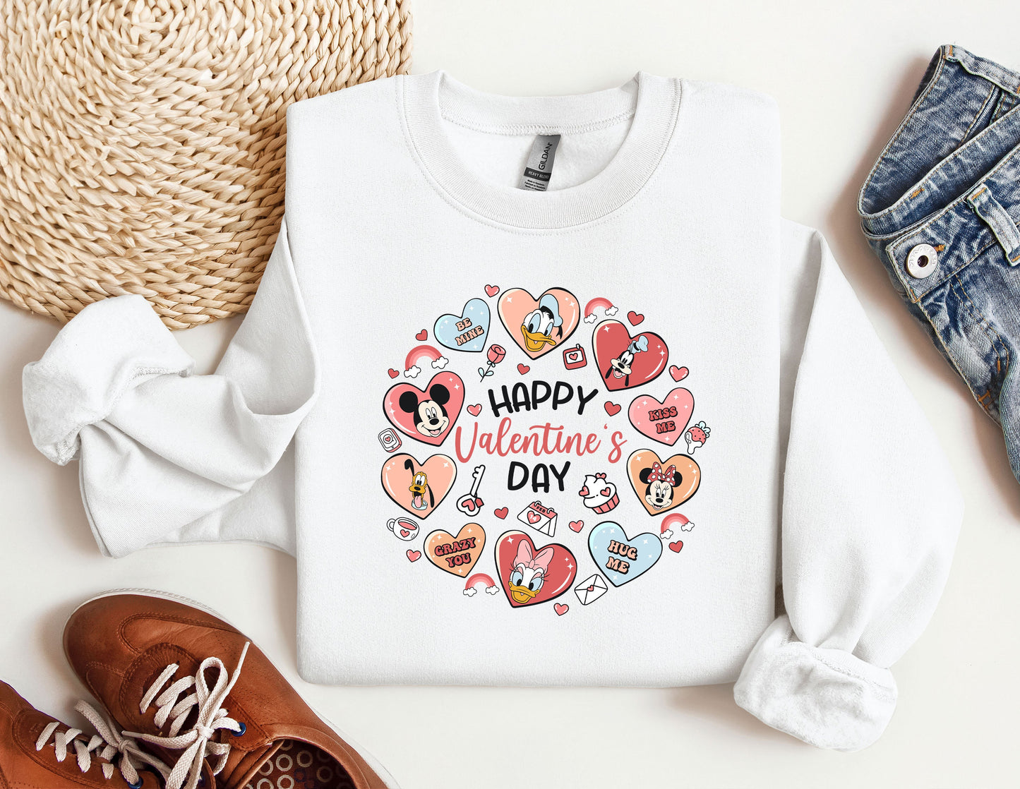 a pair of shoes and a sweater with the words happy valentine's day on