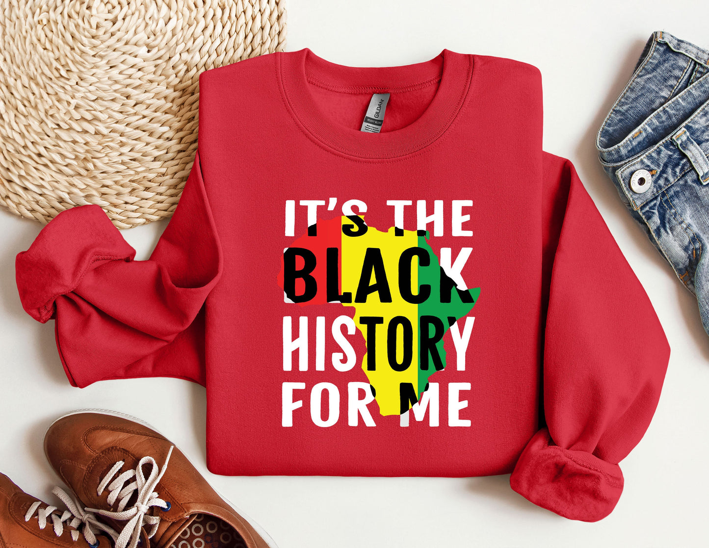 a red sweatshirt with the words it's the black history for me on it