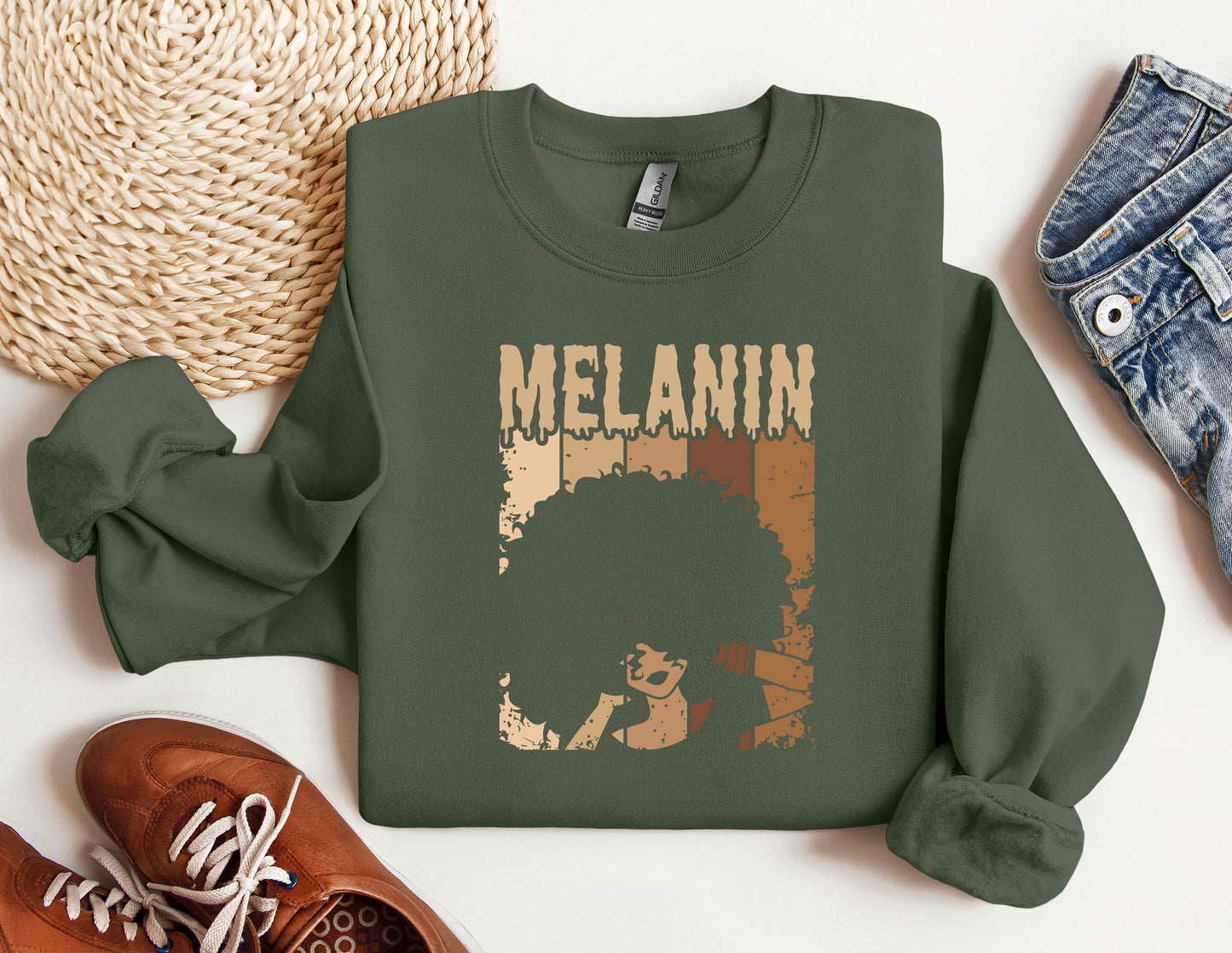a green sweatshirt with a picture of a woman's hair