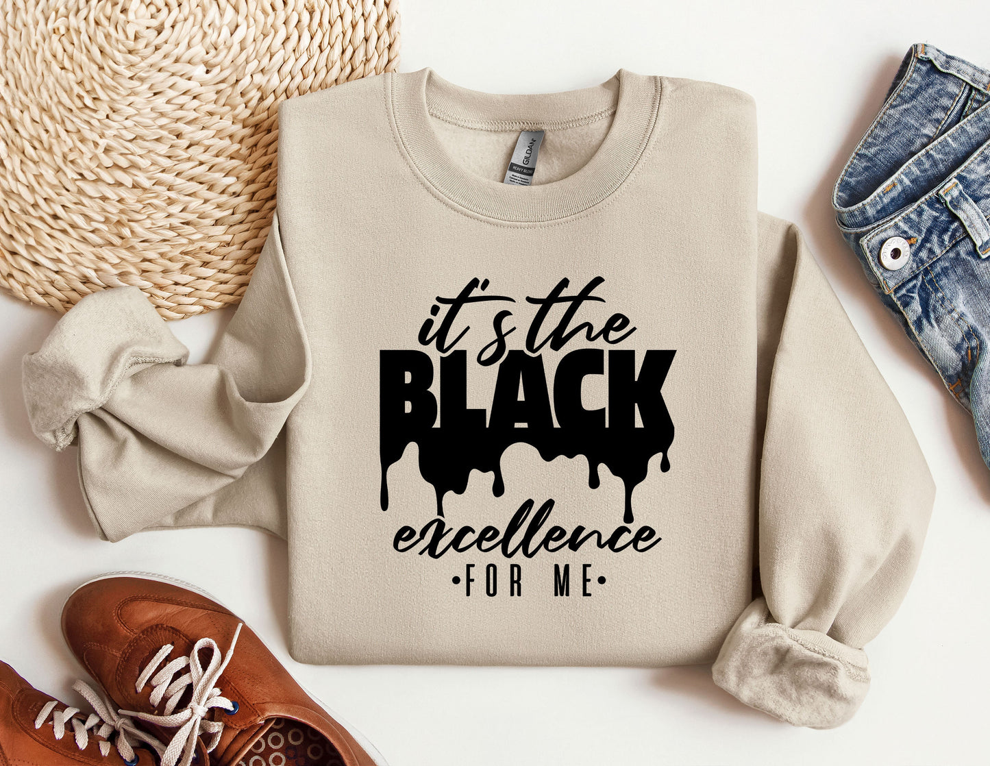 a sweater with the words it's the black excellence on it