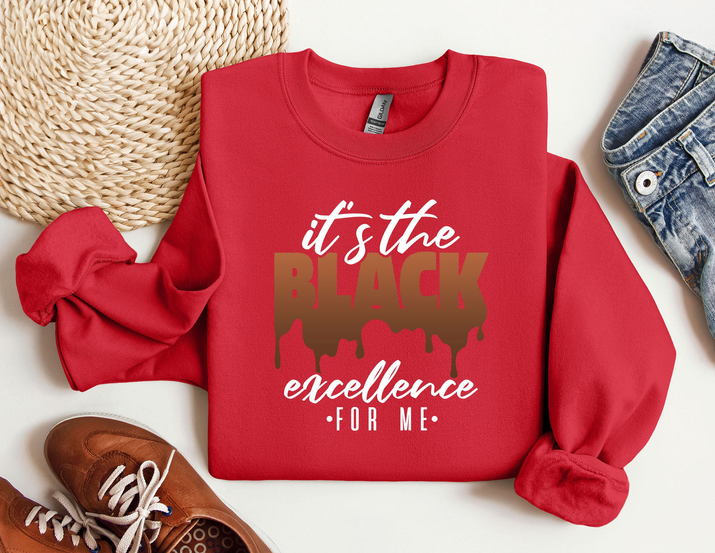 a red sweatshirt with the words it's the black excellence for me on it