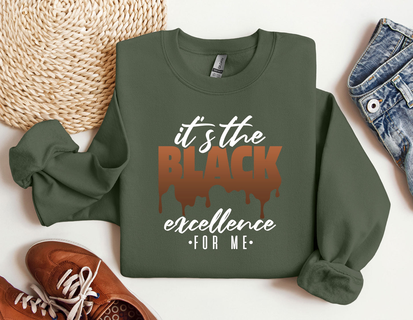 a green sweatshirt with the words it's the black excellence for me on it