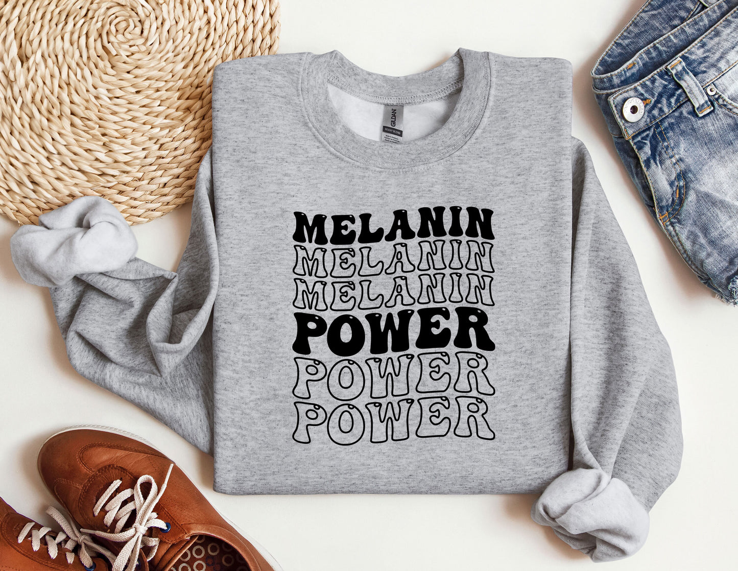 a sweatshirt with the words melanin, melanin, melanin