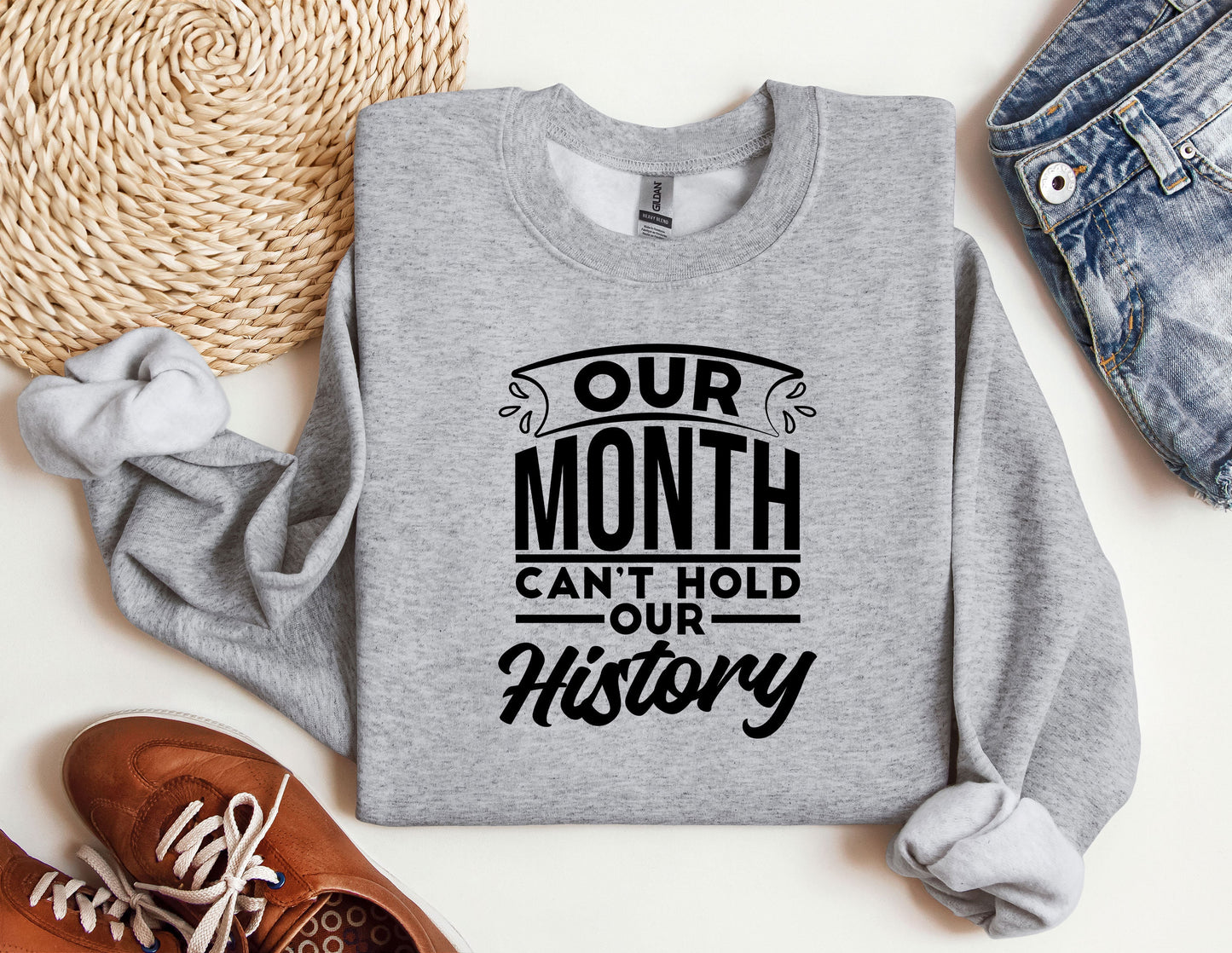a sweatshirt that says our month can't hold our history