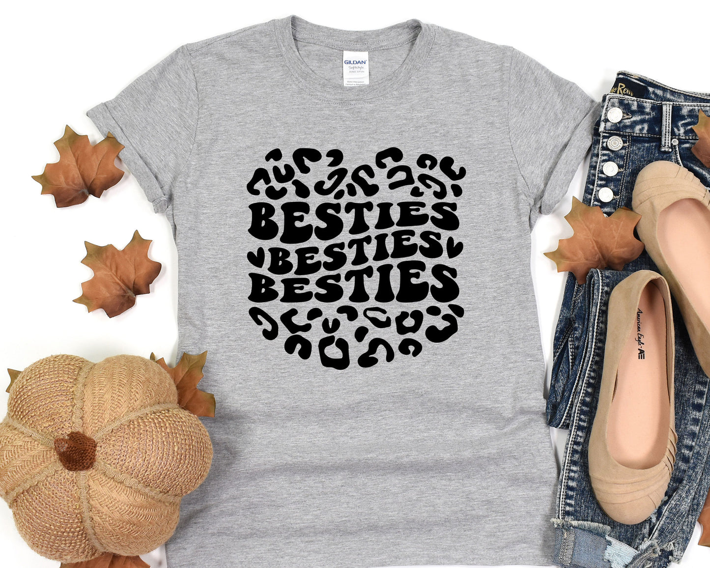 a women's t - shirt with the words besties on it