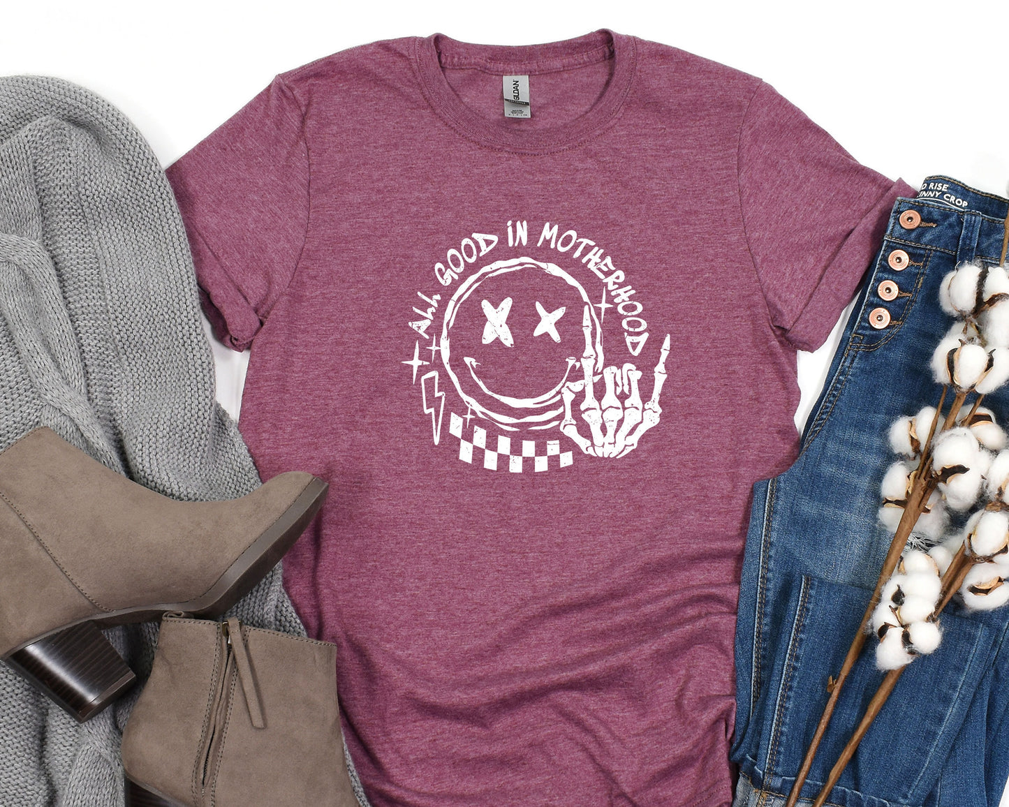 a women's t - shirt with the words good in motion on it