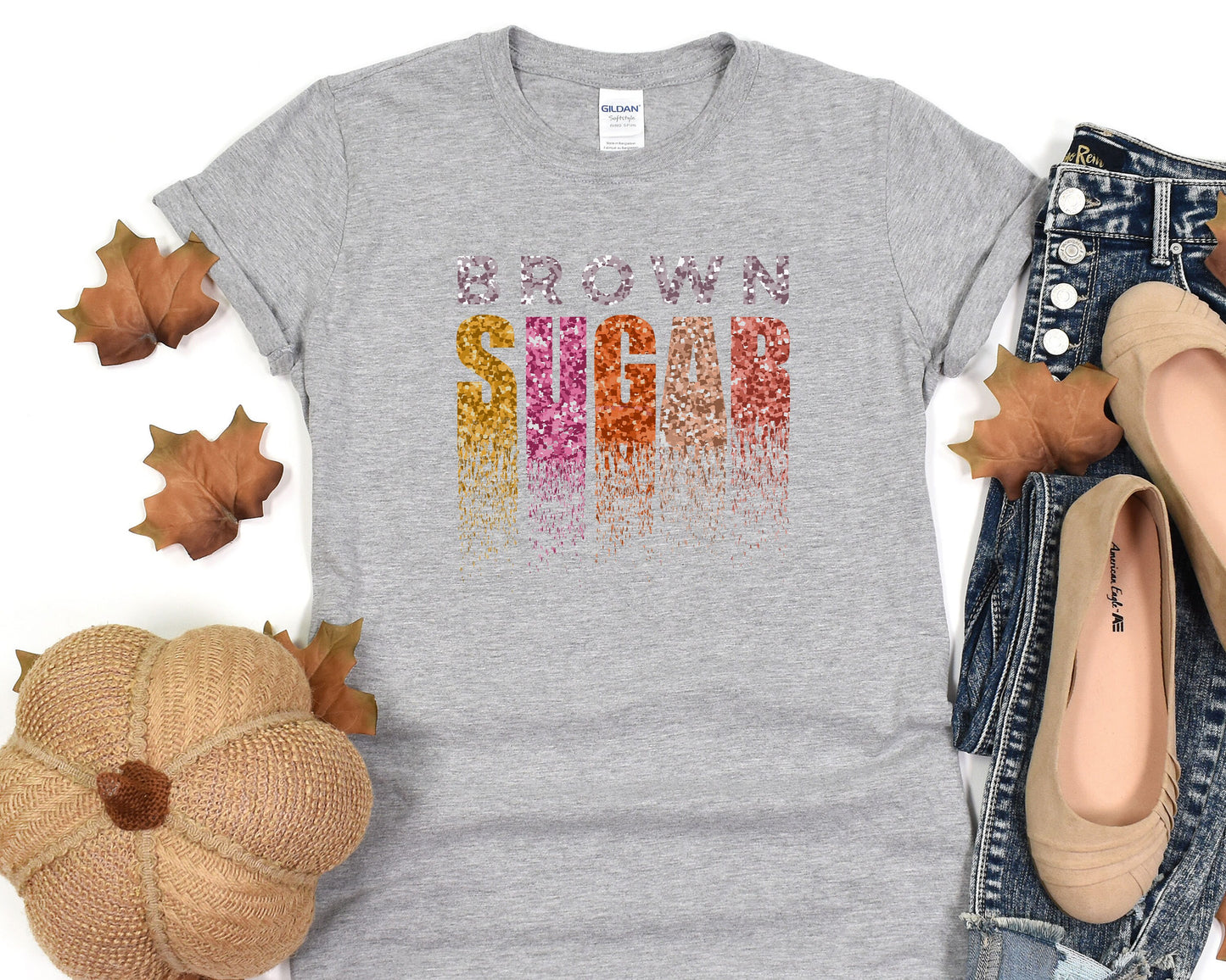 a women's t - shirt with the word fall on it
