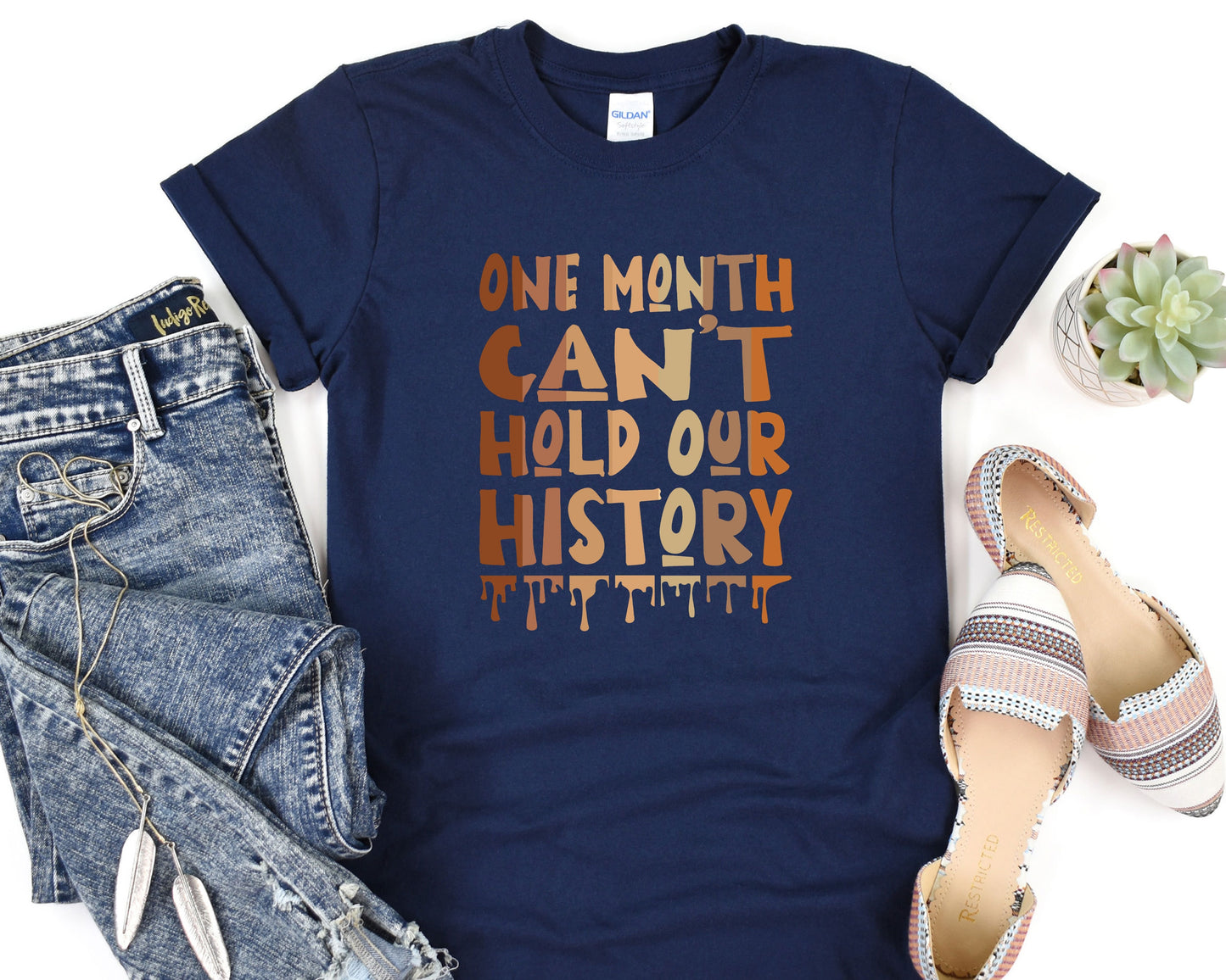 a t - shirt that says one month can't hold our history