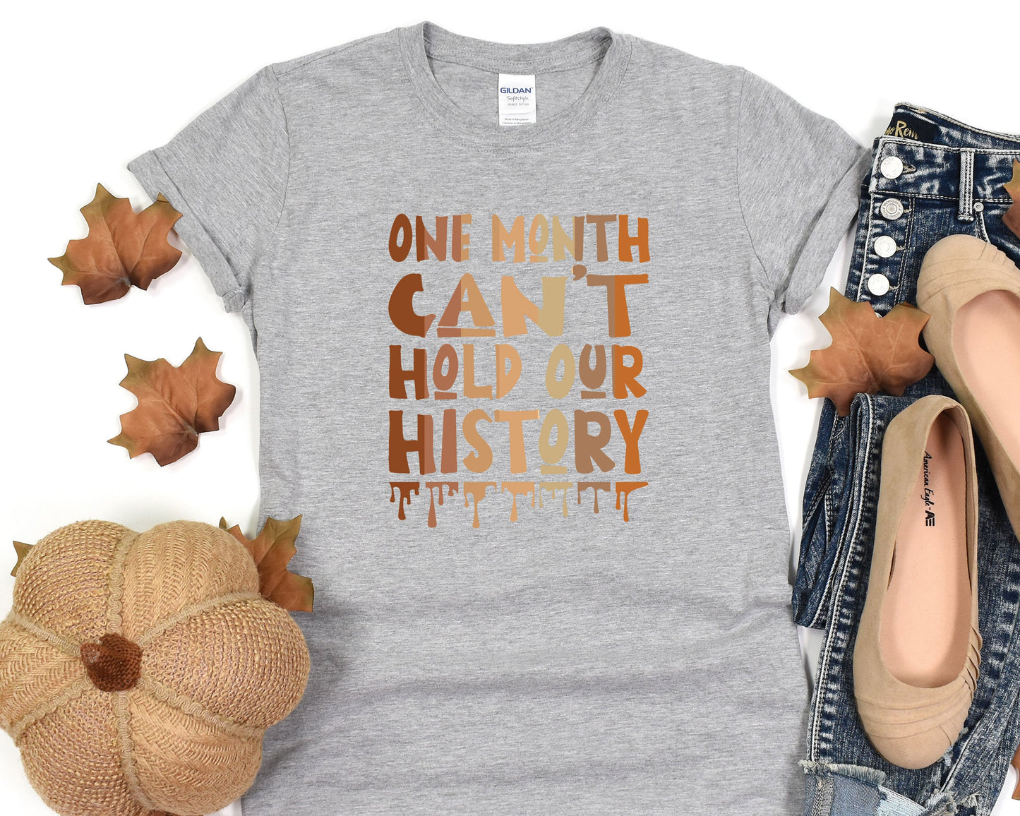 a t - shirt that says one month can't hold our history