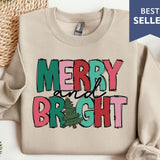 a sweater with a merry and bright design on it