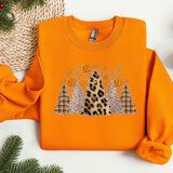 an orange sweater with a leopard print on it