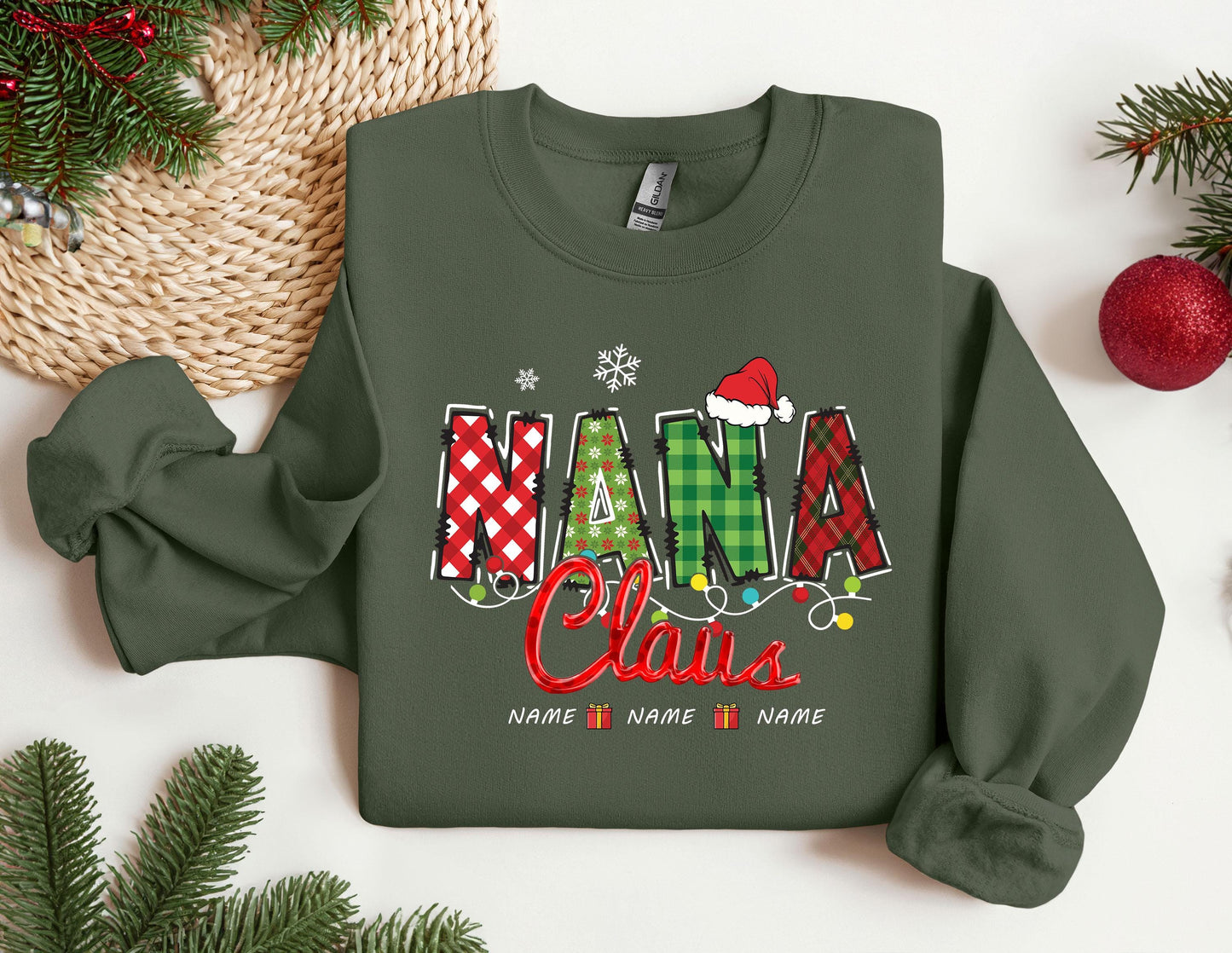 a green sweatshirt with the word mama claus on it