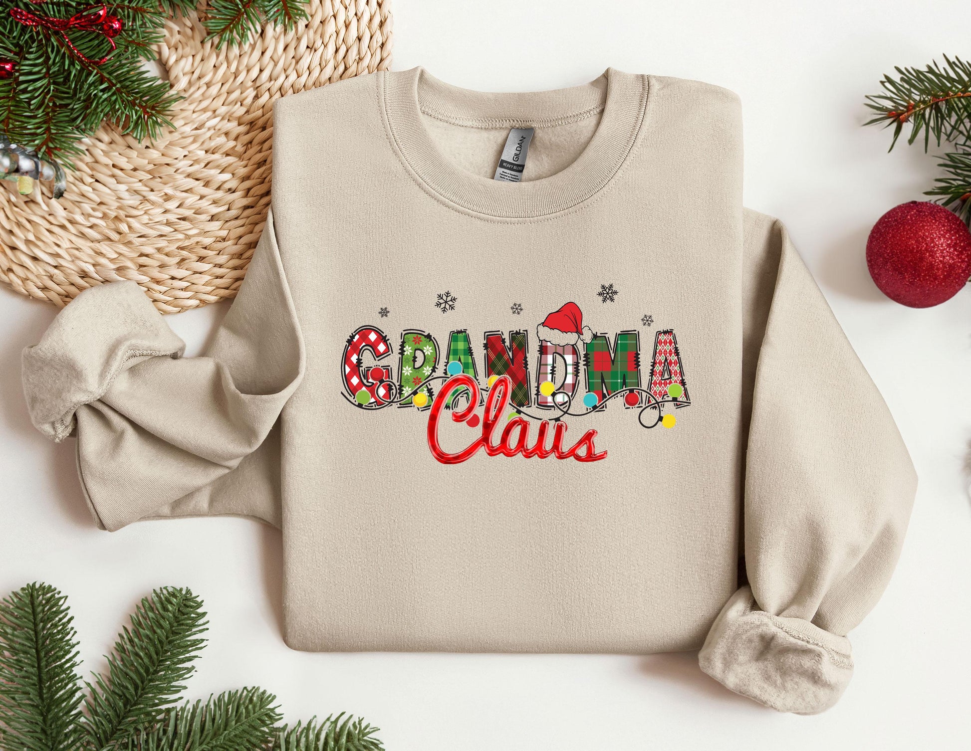 a sweater with the words grandma claus on it