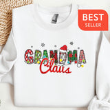 a white sweatshirt with the words grandma claus printed on it