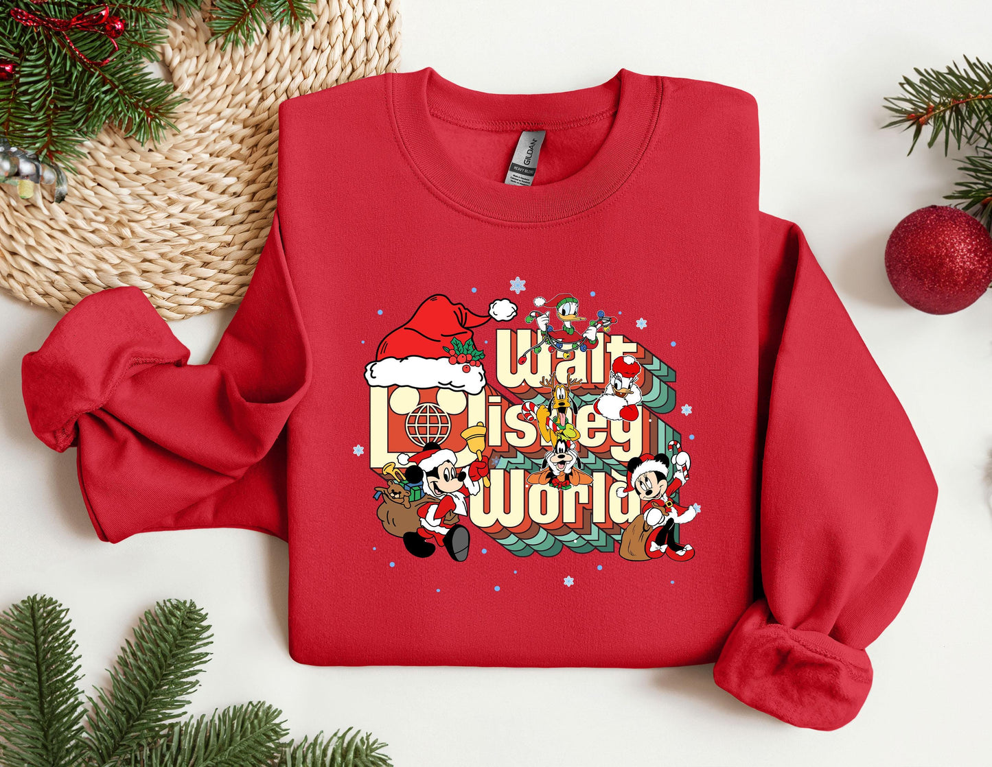 a red sweatshirt with a christmas message on it