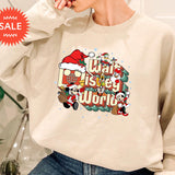 a woman sitting on a chair wearing a sweatshirt