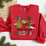 a red sweater with a christmas message on it