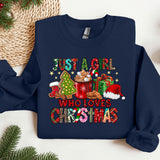 a blue sweatshirt with a christmas message on it