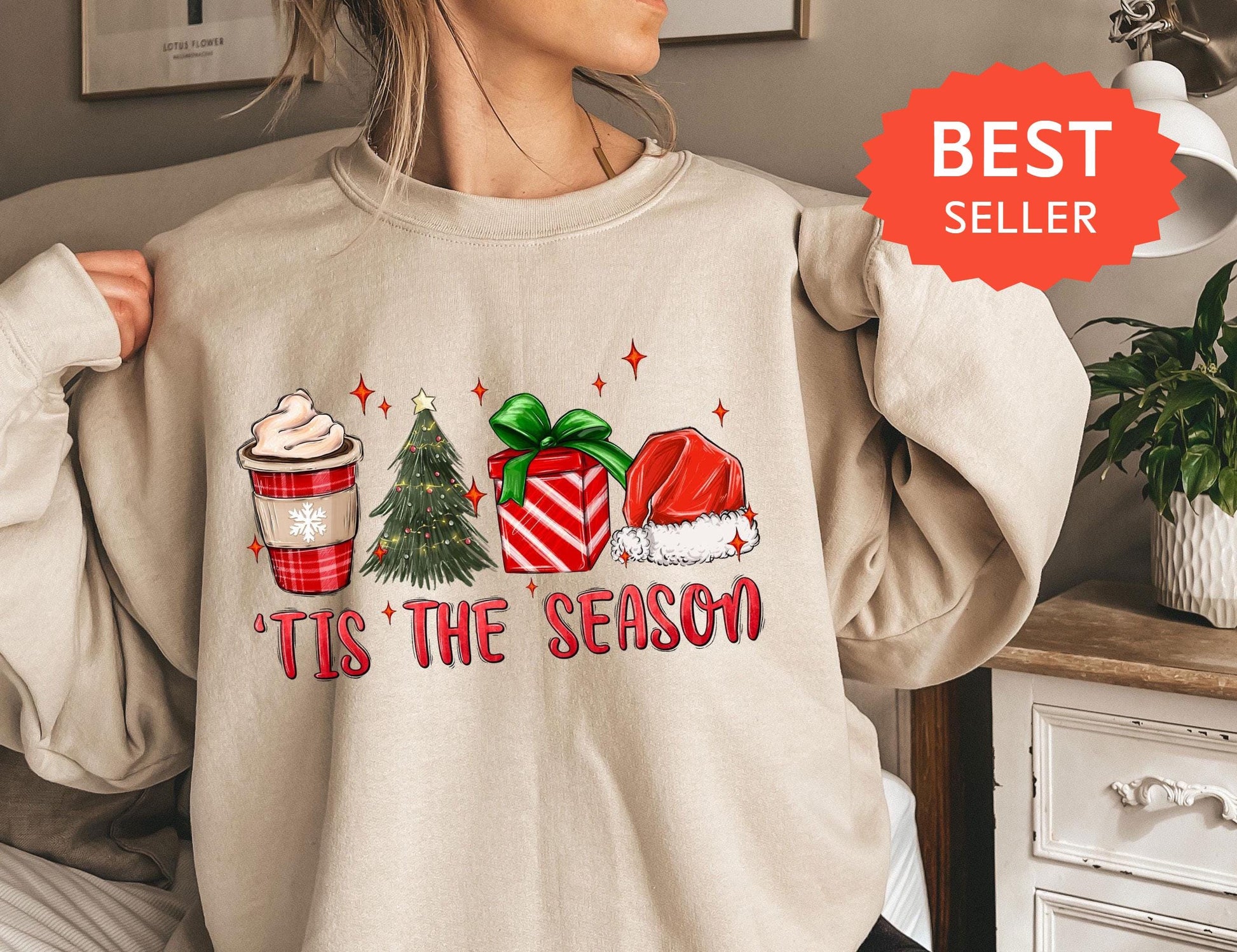 a woman wearing a sweatshirt with a christmas sweater on