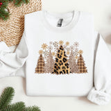 a white sweater with a leopard print on it