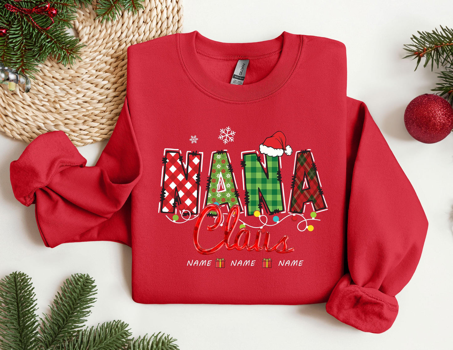 a red sweatshirt with the word santa claus on it