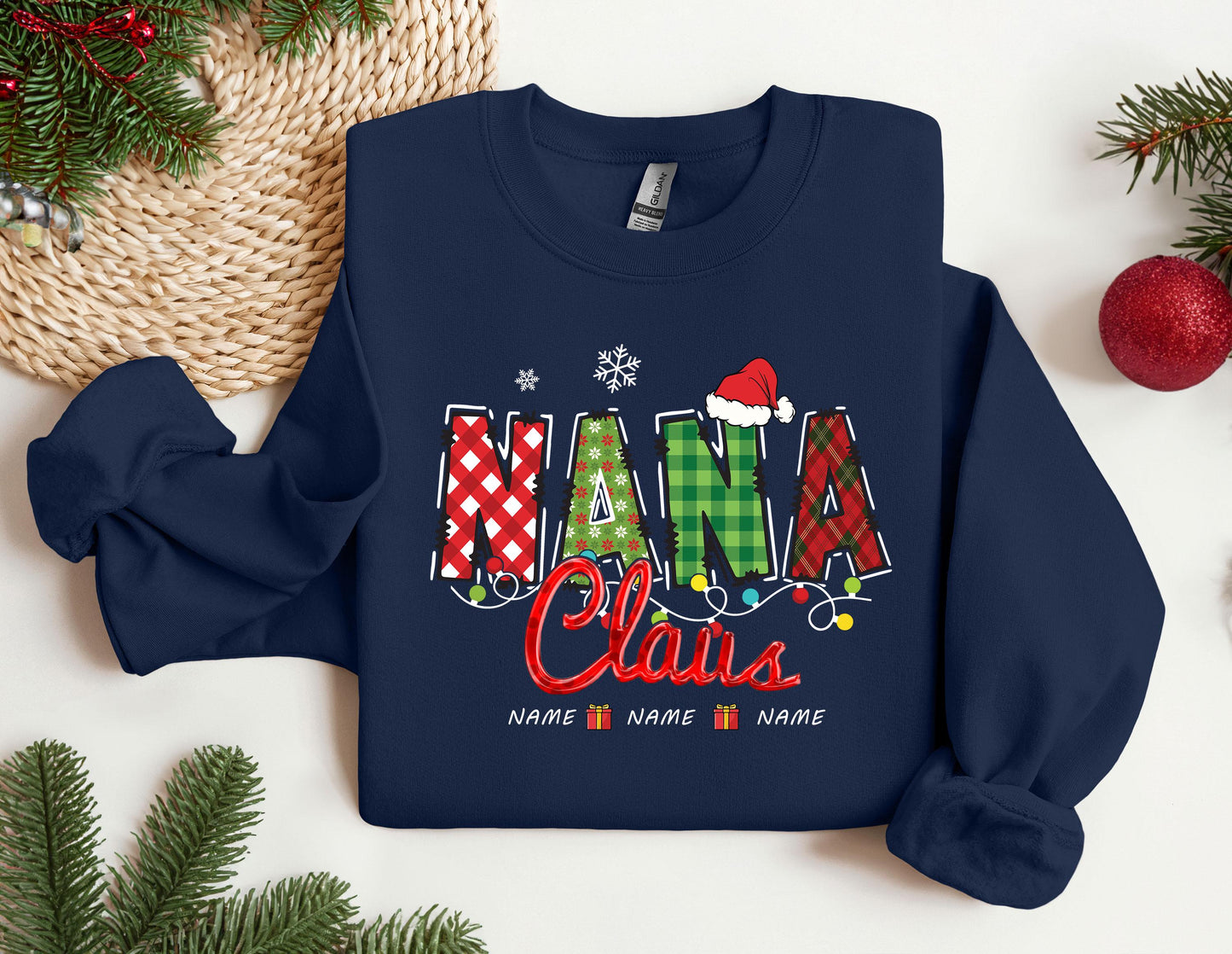 a christmas sweater with the word mama claus on it