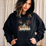 a woman wearing a black mickey mouse hoodie