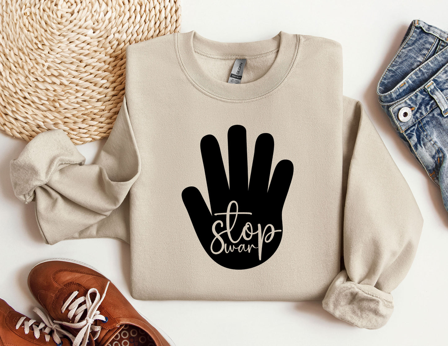 a sweater with a hand print on it