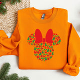 an orange shirt with a mickey mouse head on it