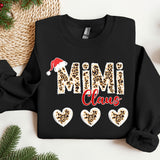 a black sweatshirt with leopard print and a santa hat