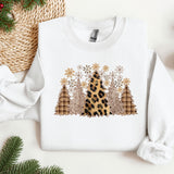 a white sweater with a leopard print on it