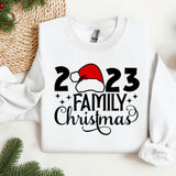 a white sweatshirt with a santa hat on it