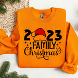 a family christmas sweatshirt with a santa hat on it