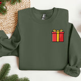 a green sweater with a red and yellow gift box on it