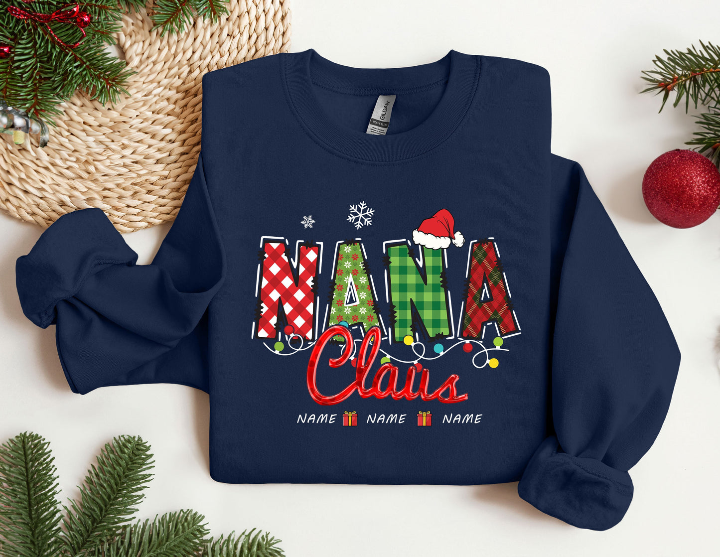 a christmas sweater with the word mama claus on it