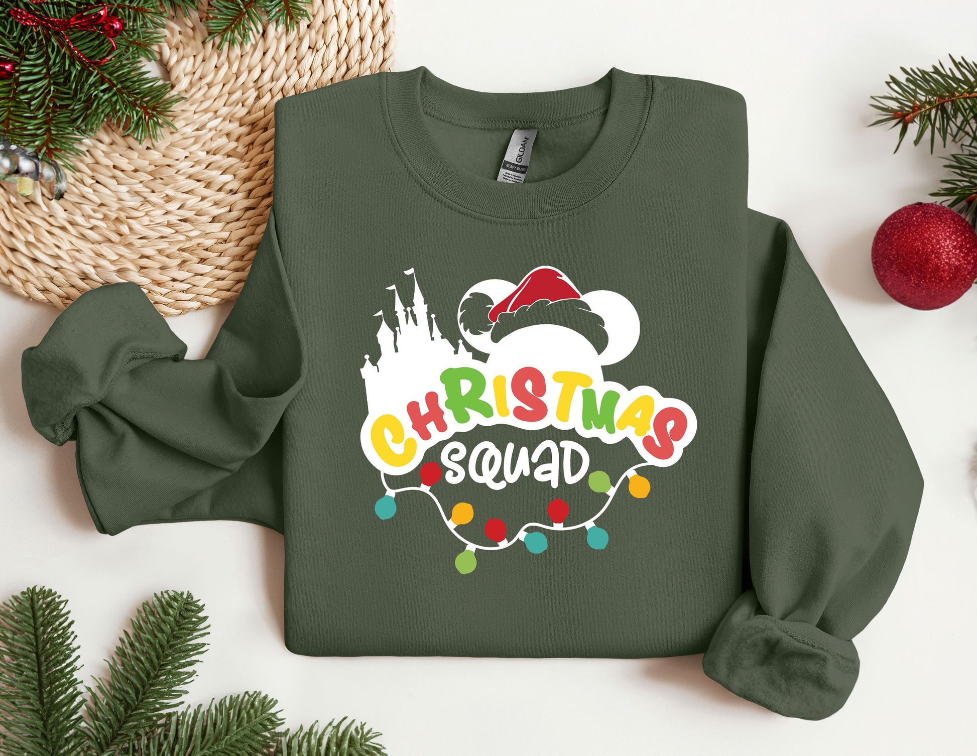 a green sweatshirt with a santa clause on it