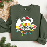 a green sweatshirt with a santa clause on it