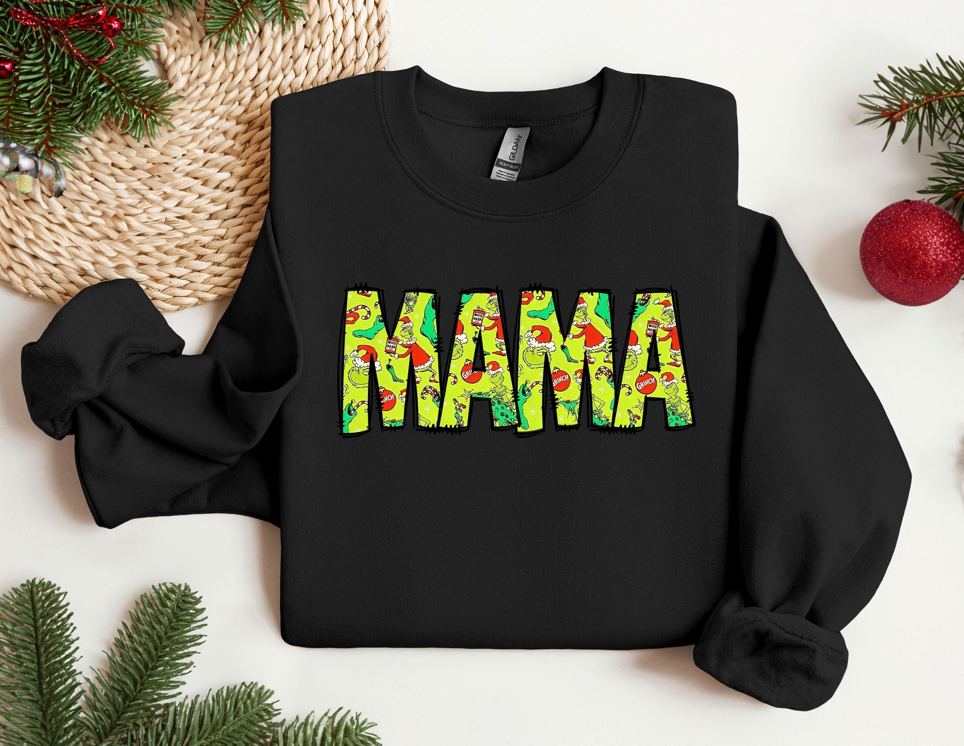 a black sweatshirt with the word mama printed on it