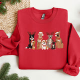 a group of dogs wearing santa hats on a red sweater
