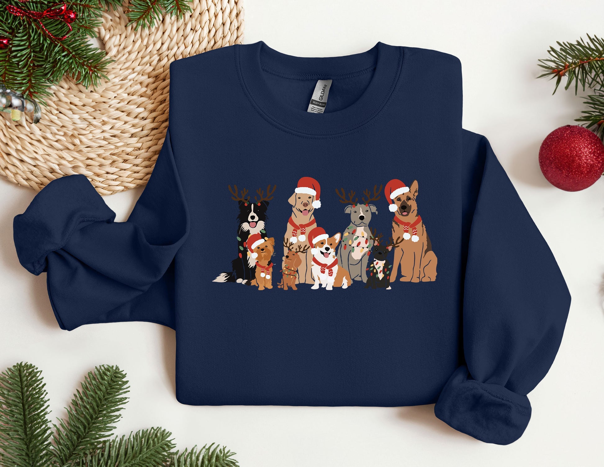 a group of dogs wearing christmas sweaters on a table