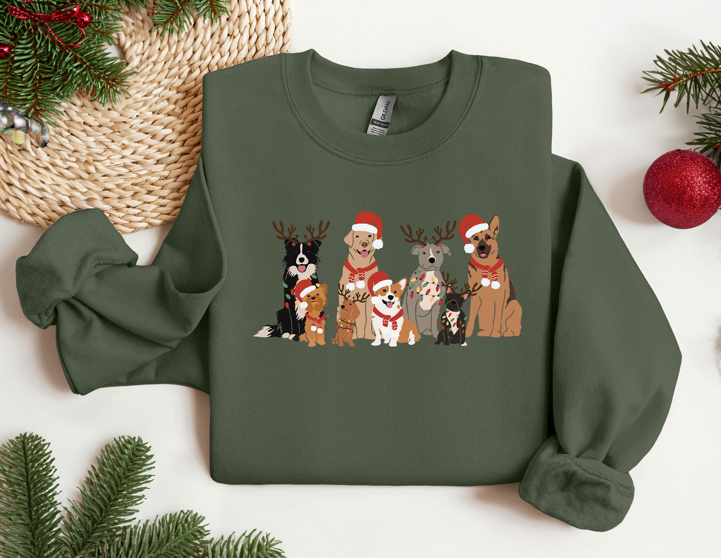 a group of dogs wearing christmas sweaters on a table