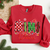 a red sweater with the word mimi claus on it