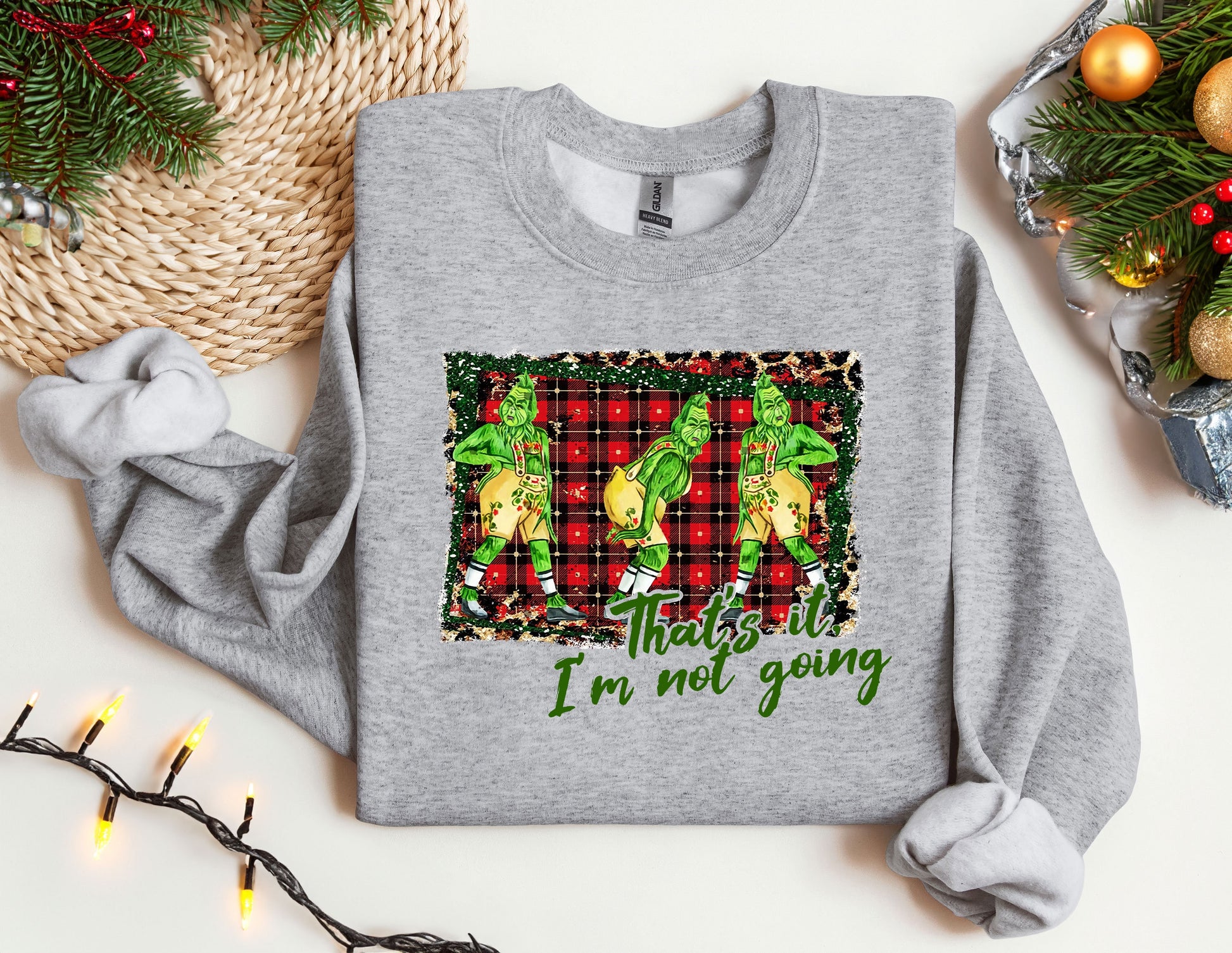 a christmas sweater with a picture of two dogs on it