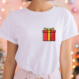 a woman wearing a t - shirt with a gift box on it