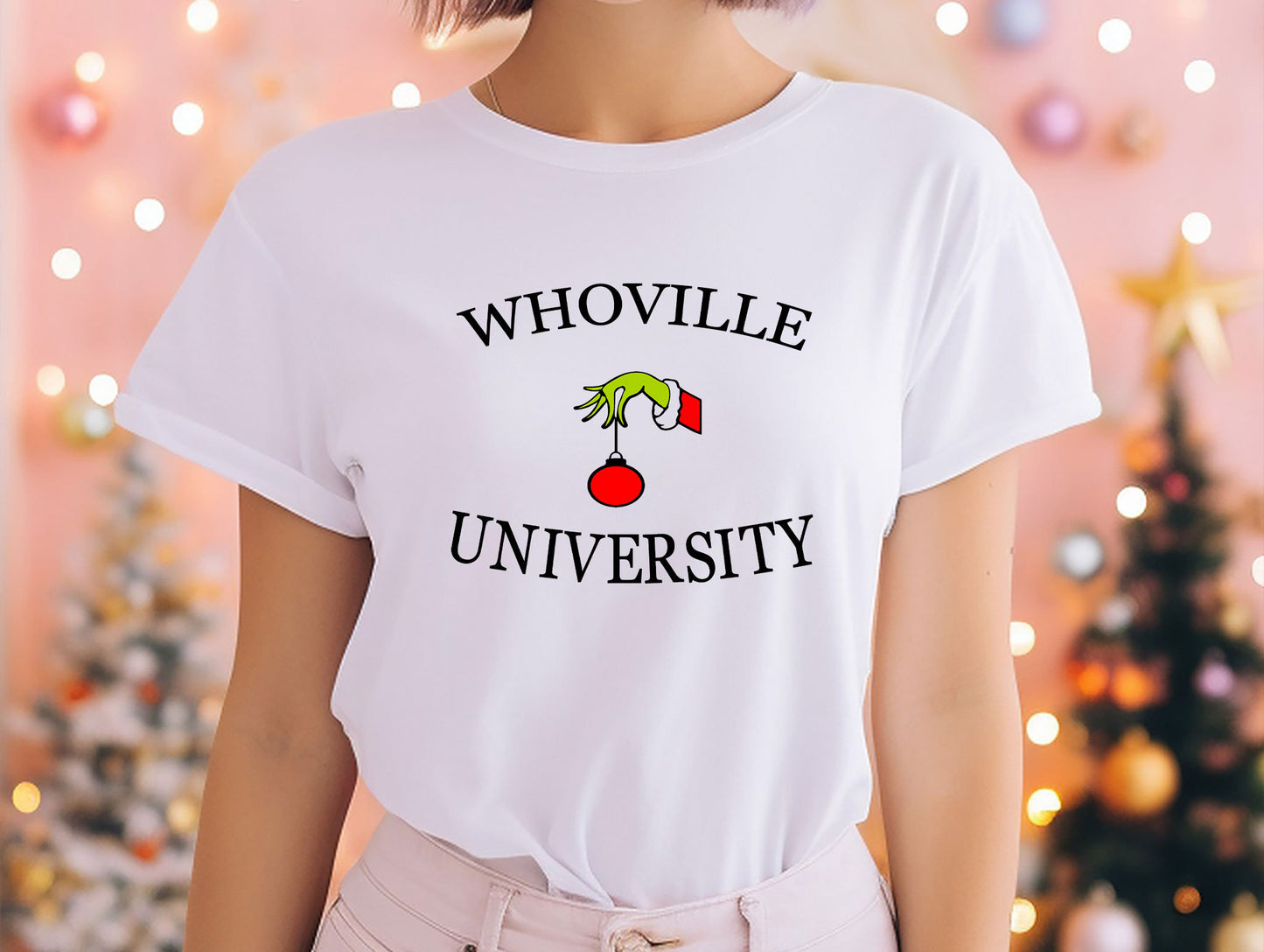 a woman wearing a t - shirt that says whoville university