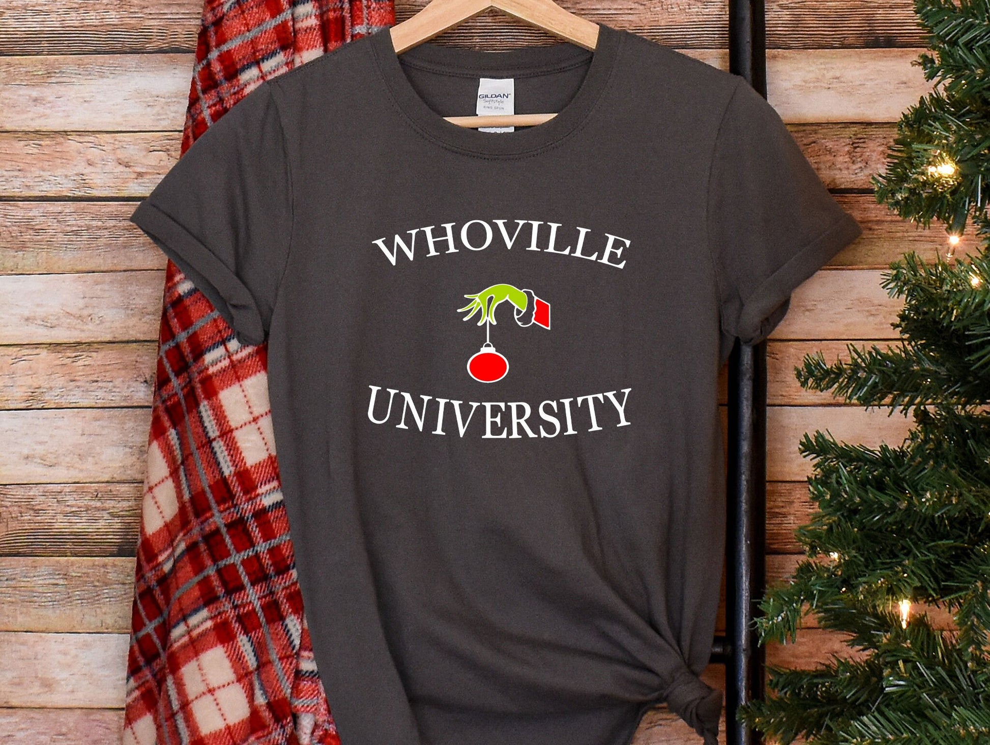 a t - shirt that says whoville university on it