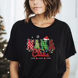a woman standing in front of a christmas tree