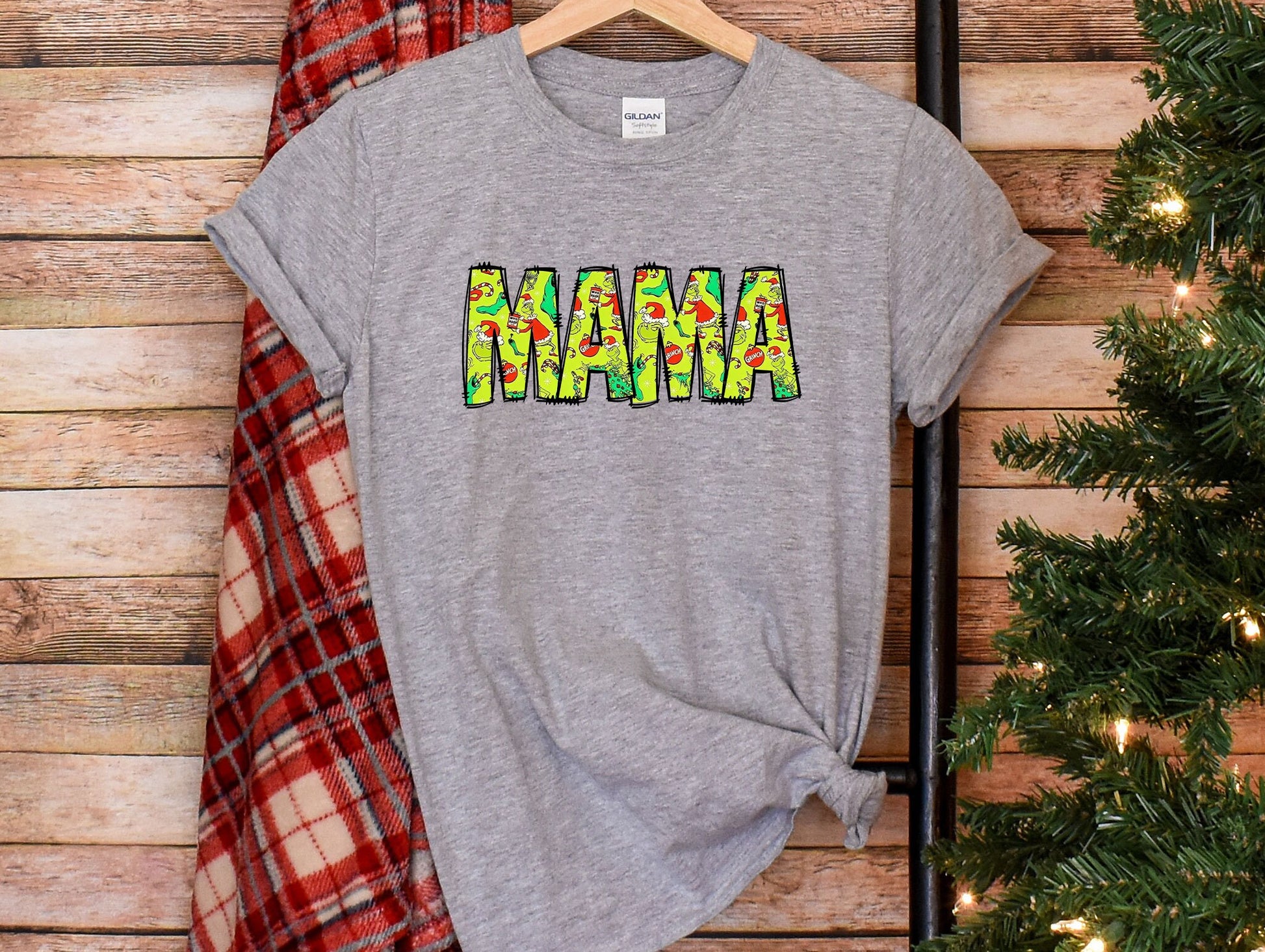 a gray shirt with the word mama printed on it